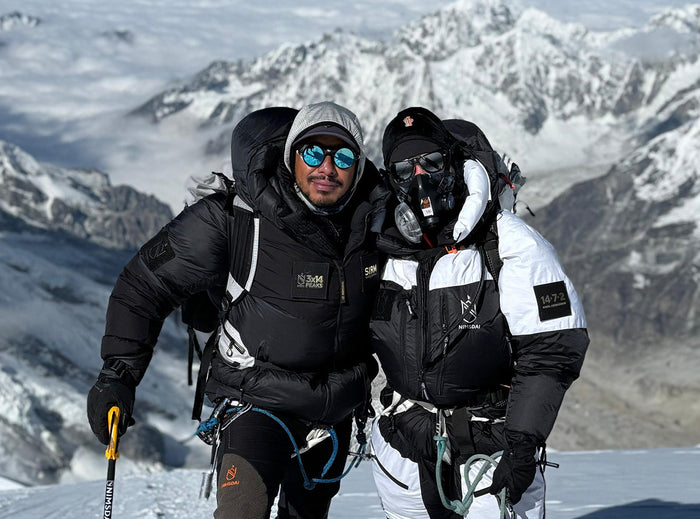 Nimsdai Purja & Nikol on the summit of Kanchenjunga